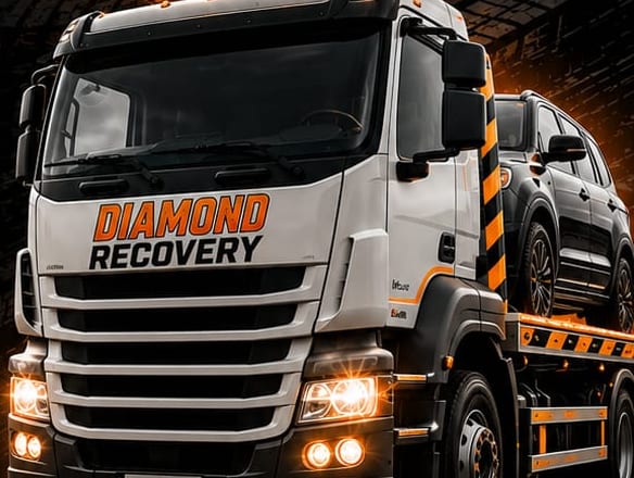 Diamond Recovery truck at night
